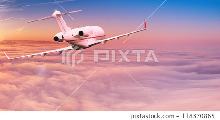 Passengers commercial airplane flying above clouds in sunset light. Concept of fast travel, holidays and business. Passengers commercial airplane flying above clouds in sunset light. Concept of fast travel, holidays and business. 118370865