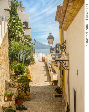 Narrow street in Altea, Spain 118371161