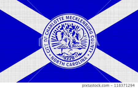 Flag of the city of Charlotte, North Carolina, USA, on a background of fabric texture. Conceptual collage 118371294