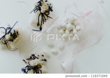 Aerial view of Italian confetti candies (sugared almond confections) and bonbonnieres Aerial view of Italian confetti candies (sugared almond confections) and bonbonnieres 118371849