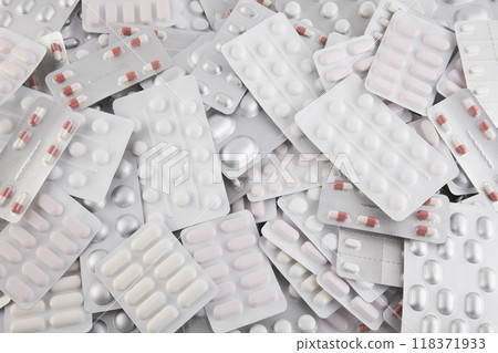 Big heap of many various pills and tablets packs and blisters Big heap of many various pills and tablets packs and blisters 118371933