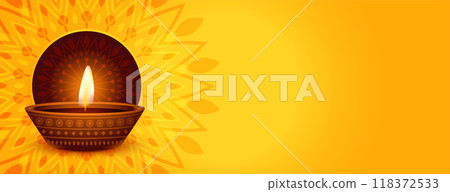 realistic diya with text space on yellow banner for diwali festival 118372533