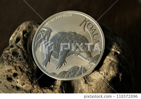 Pure silver investment coin. A sleeping Australian koala. 118372896