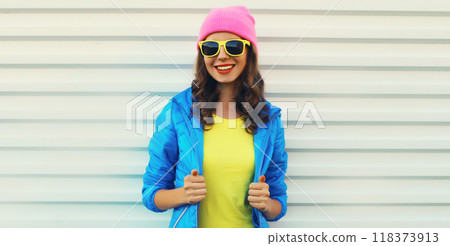 Stylish happy modern young woman in vivid colorful clothing, fashion smiling teenage girl posing 118373913