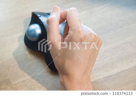 Hand operating a mouse Hand operating a mouse 118374113