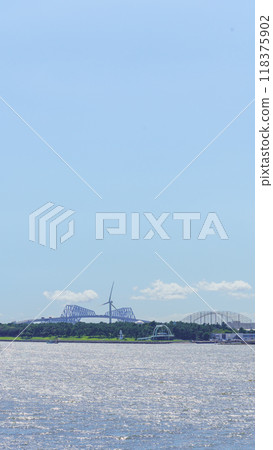 [Tokyo] Wakasu Seaside Park and Tokyo Gate Bridge (taken from the Arakawa Health Path) 118375902