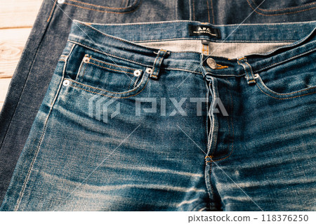 Comparison of jeans color fading Comparison of jeans color fading 118376250