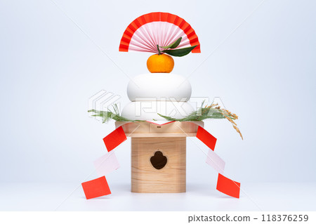 A photo with a "Kagami mochi" in the center, on a white background, with a Sanpo (pedestal) A photo with a "Kagami mochi" in the center, on a white background, with a Sanpo (pedestal) 118376259