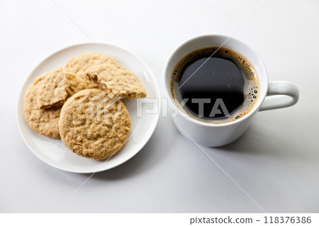 Cup of black coffee, Cookies on white marble background. Cup of black coffee, Cookies on white marble background. 118376386