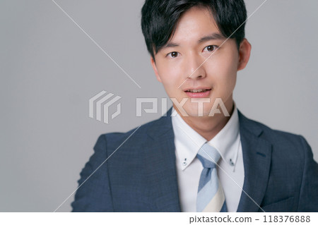 A young man in a suit 118376888