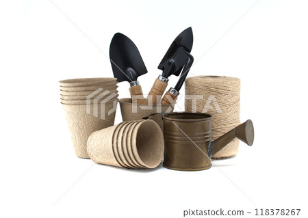 Gardening tools with organic pots, trowels, and twine for eco-friendly cultivation Gardening tools with organic pots, trowels, and twine for eco-friendly cultivation 118378267
