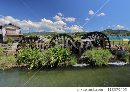 Triple water wheel in Asakura City, Fukuoka Prefecture 118379405