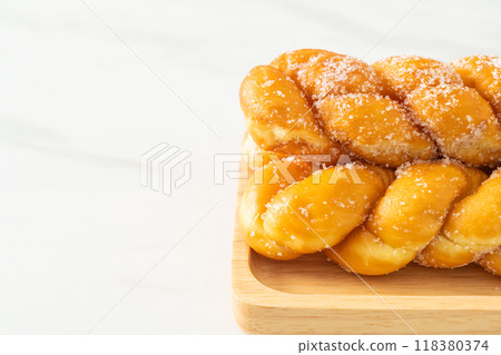 sugar doughnut in spiral shape 118380374