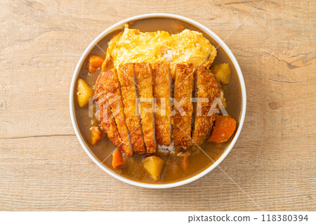 curry rice with fried pork cutlet and creamy omelet 118380394