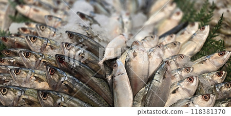 Fish market fresh produce on display on wet market in Asia, fisherman market displays seafood for local buyer, seafood market Fish market fresh produce on display on wet market in Asia, fisherman market displays seafood for local buyer, seafood market 118381370