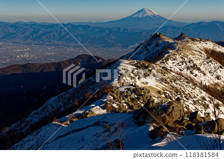 Mount Yakushi and Mount Fuji in the evening light as seen from Mount Houou and Mount Kannon in the Southern Alps 118381584