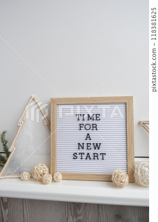 Letter board with inspirational message TIME FOR A NEW START with natural zero waste homemade Christmas decor. Happy new year promises resolutions. Self growth and personal development Letter board with inspirational message TIME FOR A NEW START with natural zero waste homemade Christmas decor. Happy new year promises resolutions. Self growth and personal development 118381625