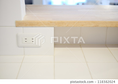 Power outlet installed in the kitchen 118382024