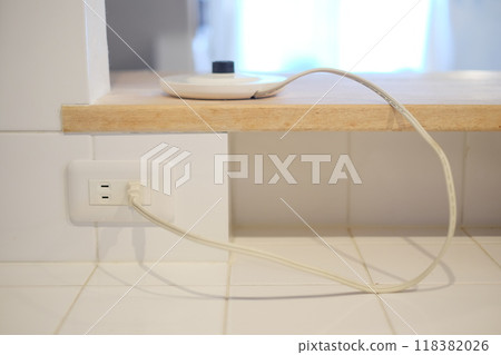 Power outlet installed in the kitchen Power outlet installed in the kitchen 118382026
