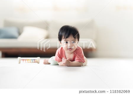 0 year old boy crawling 0 year old boy crawling 118382069
