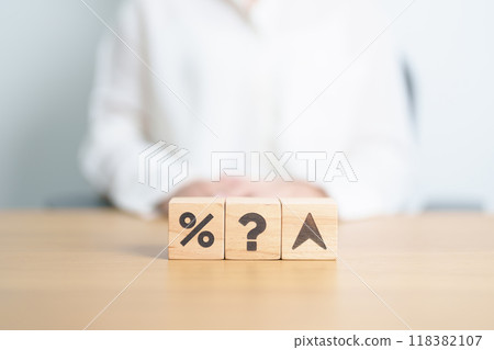wood block of Question mark with percentage change to UP and Down arrow. Interest rate, GDP, stocks market, financial, deflation and Inflation, ranking, mortgage, debt, Loan and Economic Recession 118382107