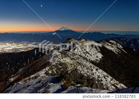 Mount Fuji and Mount Yakushi at dawn as seen from Mount Houou and Mount Kannon in the Southern Alps Mount Fuji and Mount Yakushi at dawn as seen from Mount Houou and Mount Kannon in the Southern Alps 118382783