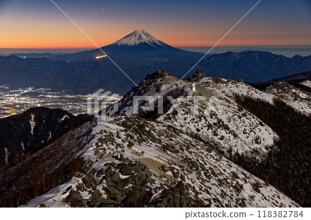 Mount Fuji and Mount Yakushi at dawn as seen from Mount Houou and Mount Kannon in the Southern Alps Mount Fuji and Mount Yakushi at dawn as seen from Mount Houou and Mount Kannon in the Southern Alps 118382784