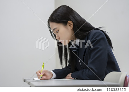 Profile of a high school girl studying. Photo courtesy of Ariake College of Education and Arts. Profile of a high school girl studying. Photo courtesy of Ariake College of Education and Arts. 118382855