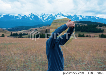 Man standing in in summer Altai mountains Man standing in in summer Altai mountains 118382866