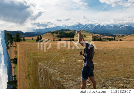 Man standing in in summer Altai mountains 118382867