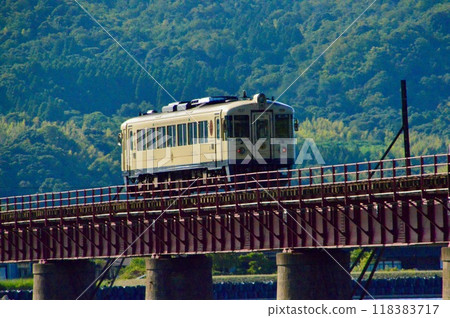 A train passing over the Yura River Bridge (Maizuru City, Kyoto Prefecture - Miyazu City) A train passing over the Yura River Bridge (Maizuru City, Kyoto Prefecture - Miyazu City) 118383717