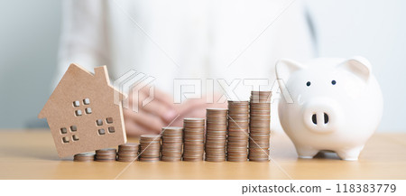 Money Saving, Property investment, House Mortgage, Loan and Real Estate Financial concepts. woman with coins stack piggy bank and Home model, Money stack Counting arrangement for deposit and Tax Money Saving, Property investment, House Mortgage, Loan and Real Estate Financial concepts. woman with coins stack piggy bank and Home model, Money stack Counting arrangement for deposit and Tax 118383779