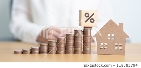 block of percentage with Home model and money coins stack. Real estate Mortgage, Refinance, House loan and debt, Interest rate, Insurance, Financial and Property Tax concepts block of percentage with Home model and money coins stack. Real estate Mortgage, Refinance, House loan and debt, Interest rate, Insurance, Financial and Property Tax concepts 118383794