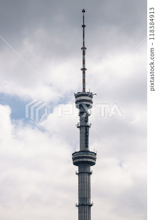 Koktobe Television and radio broadcast tower in Almaty, Kazakhstan. TV towers against the background of a cloudy sky. Koktobe Television and radio broadcast tower in Almaty, Kazakhstan. TV towers against the background of a cloudy sky. 118384913