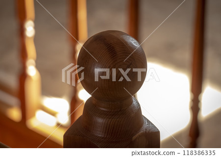 Wooden baluster close-up 118386335