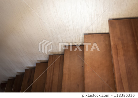 Fragment of a wooden staircase 118386336