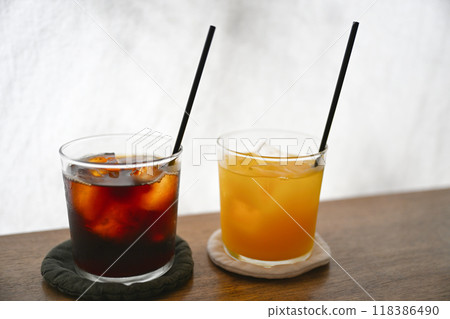 Ice coffee and orange juice Ice coffee and orange juice 118386490