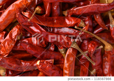 Dried red chili pepper texture background Dried red chili pepper texture background 118387866