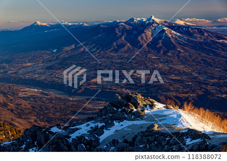 The Yatsugatake mountain range at sunrise as seen from Mt. Houou and Mt. Kannon in the Southern Alps The Yatsugatake mountain range at sunrise as seen from Mt. Houou and Mt. Kannon in the Southern Alps 118388072
