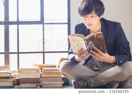 A man reading a book A man reading a book 118388785