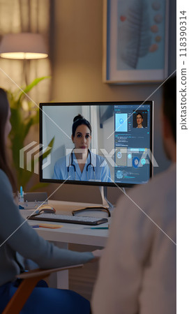 Couple consults with doctor through video call chat 118390314