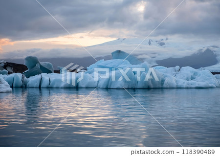 Ice formations of a glacier in Iceland at sunset. Ice formations of a glacier in Iceland at sunset. 118390489