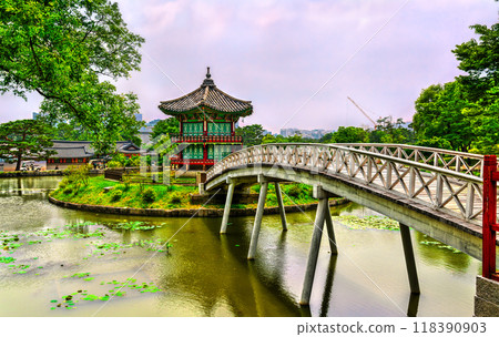 Hyangwonjeong Pavilion with Chwihyanggyo Bridge at Gyeongbokgung Palace in Seoul, South Korea 118390903
