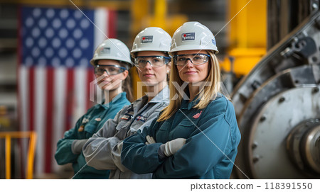 Three engineers in a factory with American flag. 118391550
