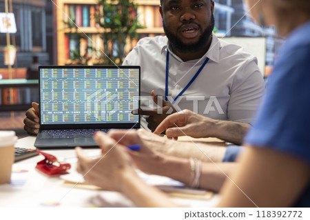 Old people exploring variety of retirement plan options with financial broker, life savings. Senior clients consulting a planner to secure a pension for future stability. 118392772