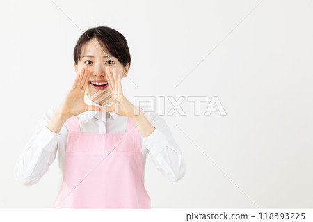 Woman in an apron making a call 02 118393225