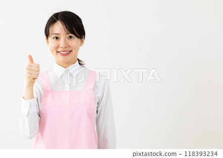 Nice! A woman in an apron posing 02 118393234