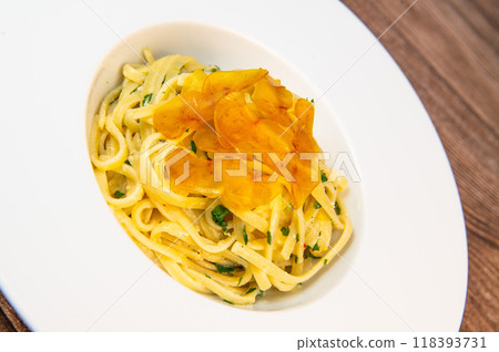 LINGUINE PASTA RECIPE WITH POUTARGUE, LEMON, GARLIC, LEMON ZEST, FRESH CREAM AND PARSLEY LINGUINE PASTA RECIPE WITH POUTARGUE, LEMON, GARLIC, LEMON ZEST, FRESH CREAM AND PARSLEY 118393731