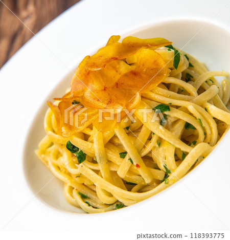 LINGUINE PASTA RECIPE WITH POUTARGUE, LEMON, GARLIC, LEMON ZEST, FRESH CREAM AND PARSLEY LINGUINE PASTA RECIPE WITH POUTARGUE, LEMON, GARLIC, LEMON ZEST, FRESH CREAM AND PARSLEY 118393775