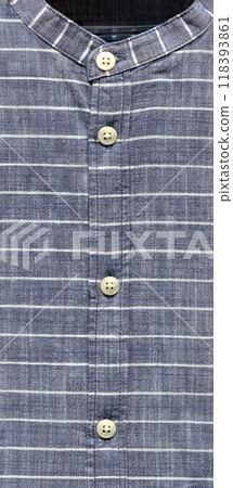 Blue and grey striped fabric, shirt buttons and details, can be used as a background Blue and grey striped fabric, shirt buttons and details, can be used as a background 118393861